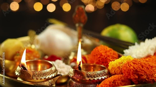 Illuminated Metal Brass Lamp Called Diya Deep Or Dia Glowing With Bokeh. Theme For Diwali, Navratri, Dussehra Puja, New Year, Deepawali, Karva Chauth, Teej, Ganesh Chaturthi Or Shubh Deepavali Pooja