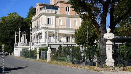 Casina Valadier with blue sky and autumn leaves at Bucarest Square Rome in Villa Borghese park