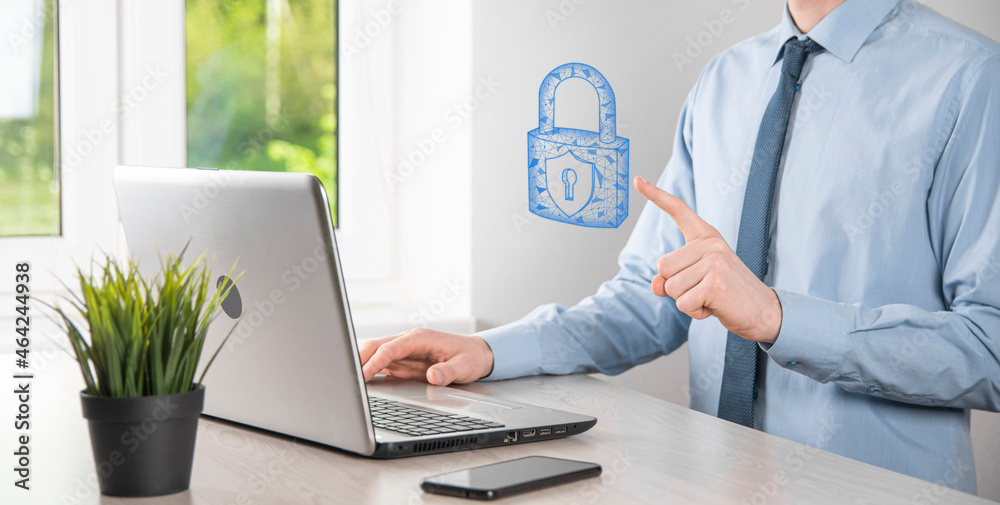 Male hand holding a lock padlock icon.Cyber security network. Internet technology networking.Protecting data personal information on tablet. Data protection privacy concept. GDPR. EU.Banner