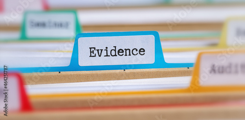 File folders with a tab labeled Evidence