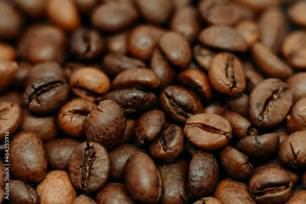 fresh roasted coffee beans as a background. a lot of coffee beans. macro photo of coffee beans fresh roasted coffee beans as a background. a lot of coffee beans. macro photo of coffee beans