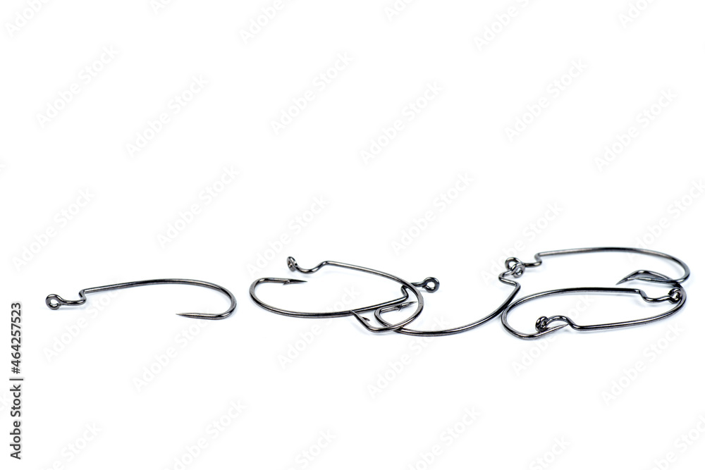 Hooks for professional spinning fishers isolated on white.