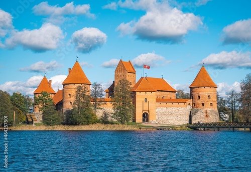 Medieval castle of Trakai, Vilnius, Lithuania, Eastern Europe, located between beautiful lakes and nature with beautiful sky and blue lake in autumn