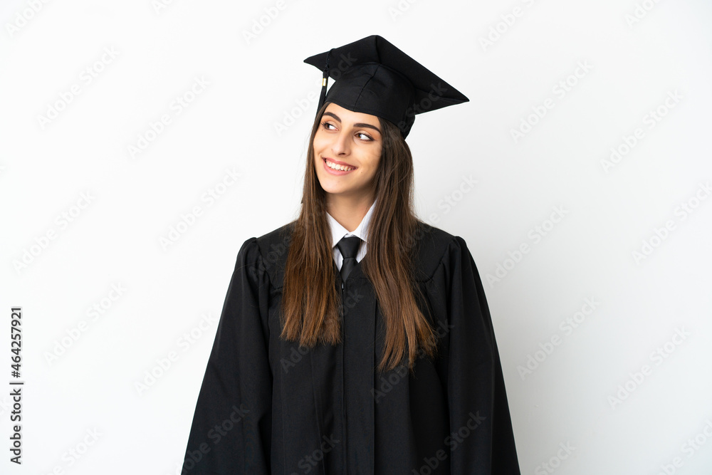 Young university graduate isolated on white background thinking an idea while looking up Young university graduate isolated on white background thinking an idea while looking up