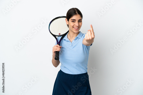 Handsome young tennis player caucasian woman isolated on white background doing coming gesture