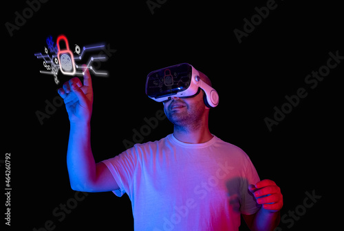 Young man making secure login with fingerprint using virtual glasses. new secure technology blockchain