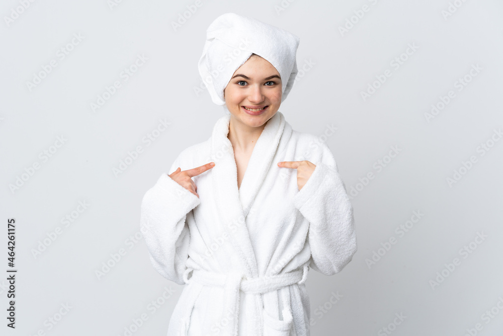 Teenager girl in a bathrobe isolated on white background with surprise facial expression Teenager girl in a bathrobe isolated on white background with surprise facial expression
