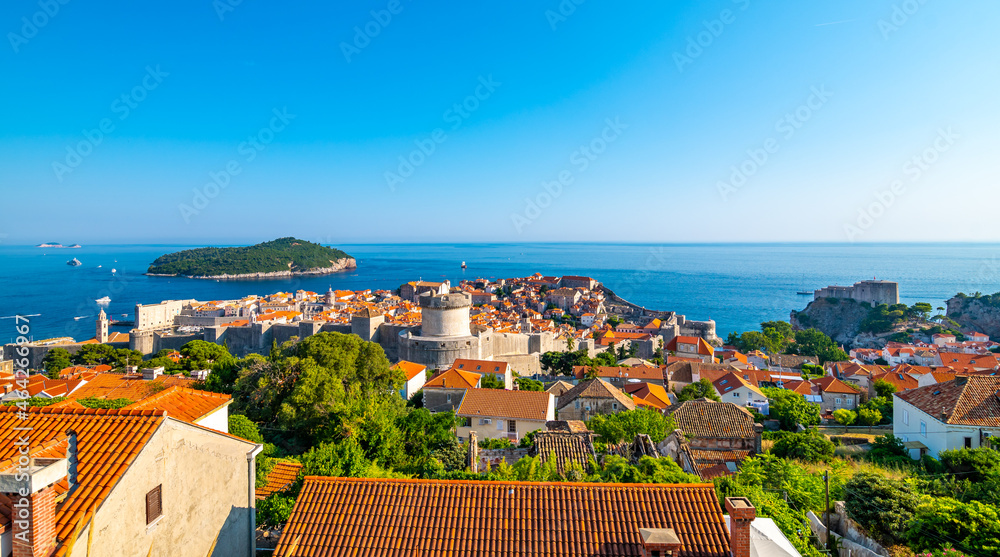 Panorama cityscape view of old town Dubronik. Famous ancient city with big city walls and beautiful architecture is great tourist destination in Croatia.Old city of Dubrovnik is part of UNESCO