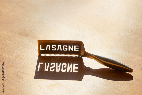lasagne cutlery on wooden table