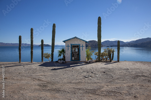 beautiful small church  ocean view in the desert  cactus  island  blue sky  mexico  baja california