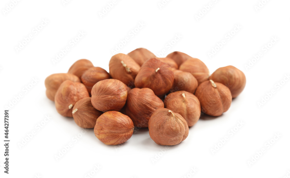 Heap of tasty hazelnuts on white background Heap of tasty hazelnuts on white background