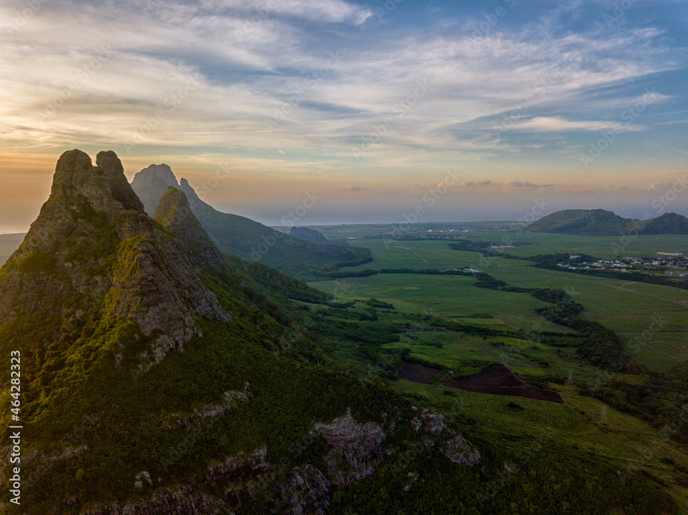 Aerial view of Trois Mamelles mountain during sunset in Mauritius Aerial view of Trois Mamelles mountain during sunset in Mauritius