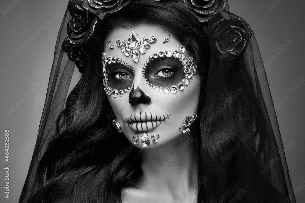 Portrait of a woman with sugar skull makeup over black background.  Halloween costume and make-up. Portrait of Calavera Catrina Stock Photo |  Adobe Stock