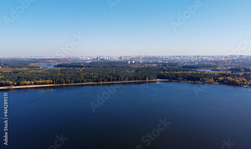 Panoramic aerial view of the forest coast of the sea. Autumn landscape