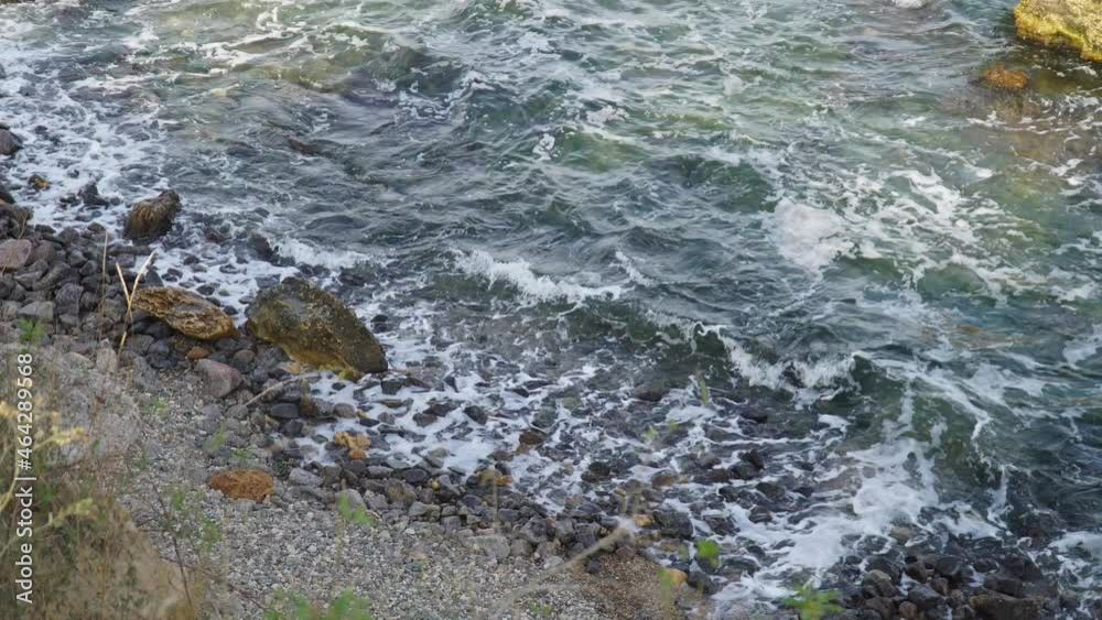 stormy sea with large stones.cave beach stormy sea with large stones.cave beach