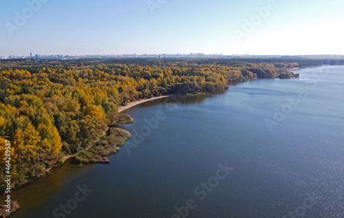Panoramic aerial view of the forest coast of the sea. Autumn landscape