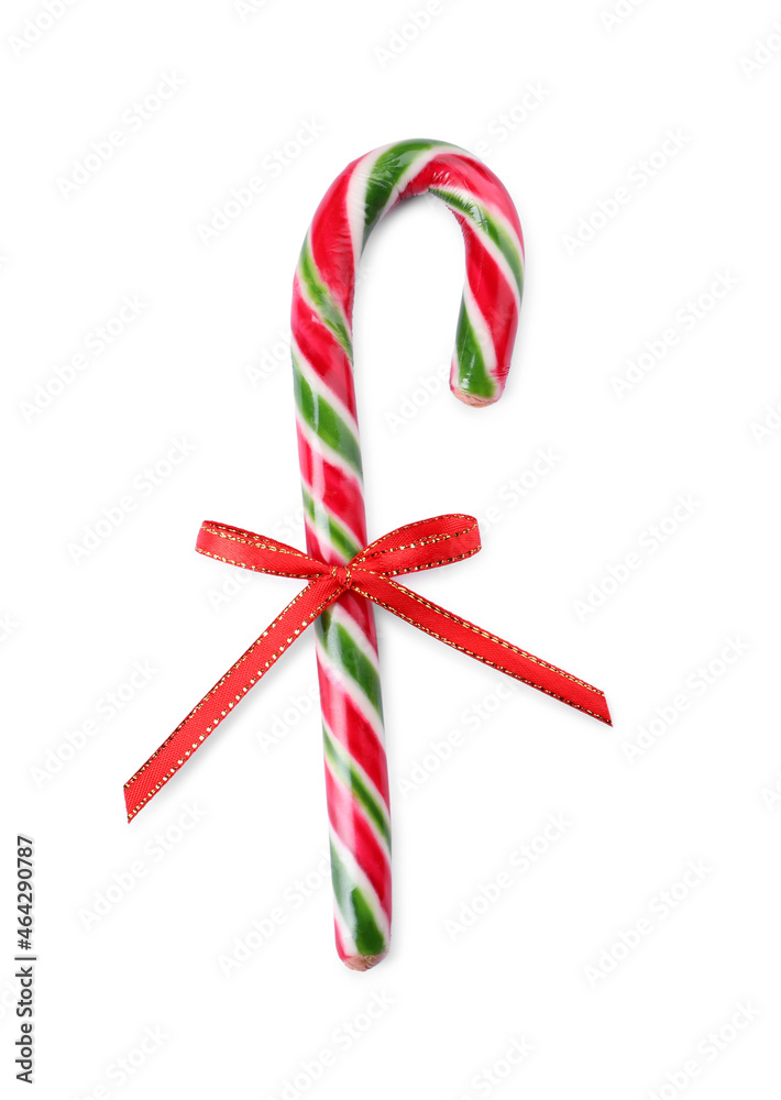 Sweet Christmas candy cane with red bow on white background, top view Sweet Christmas candy cane with red bow on white background, top view