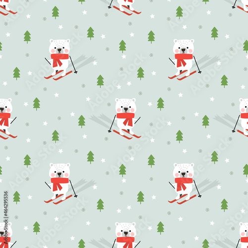 Cute polar bear plays ski in Christmas winter forest