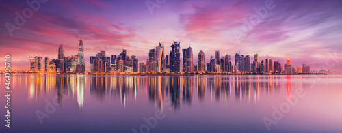 Fotografie, Obraz The Panoramic skyline of Doha, Qatar during sunrise