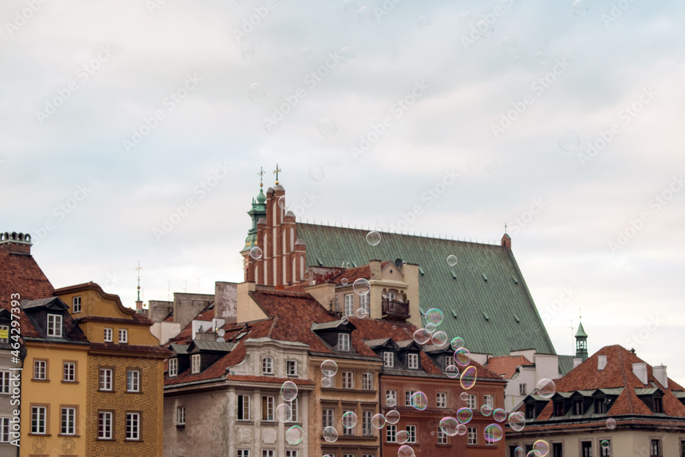 city old town warsaw poland cityscape with soap bubbles