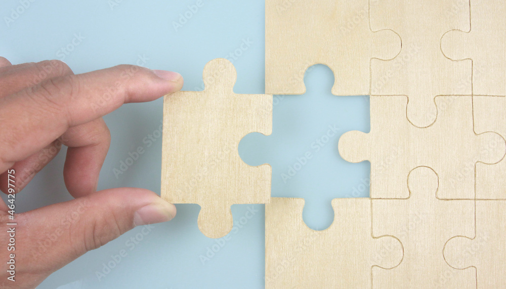 Fototapeta premium Connecting jigsaw puzzle . Business solutions success and strategy concept