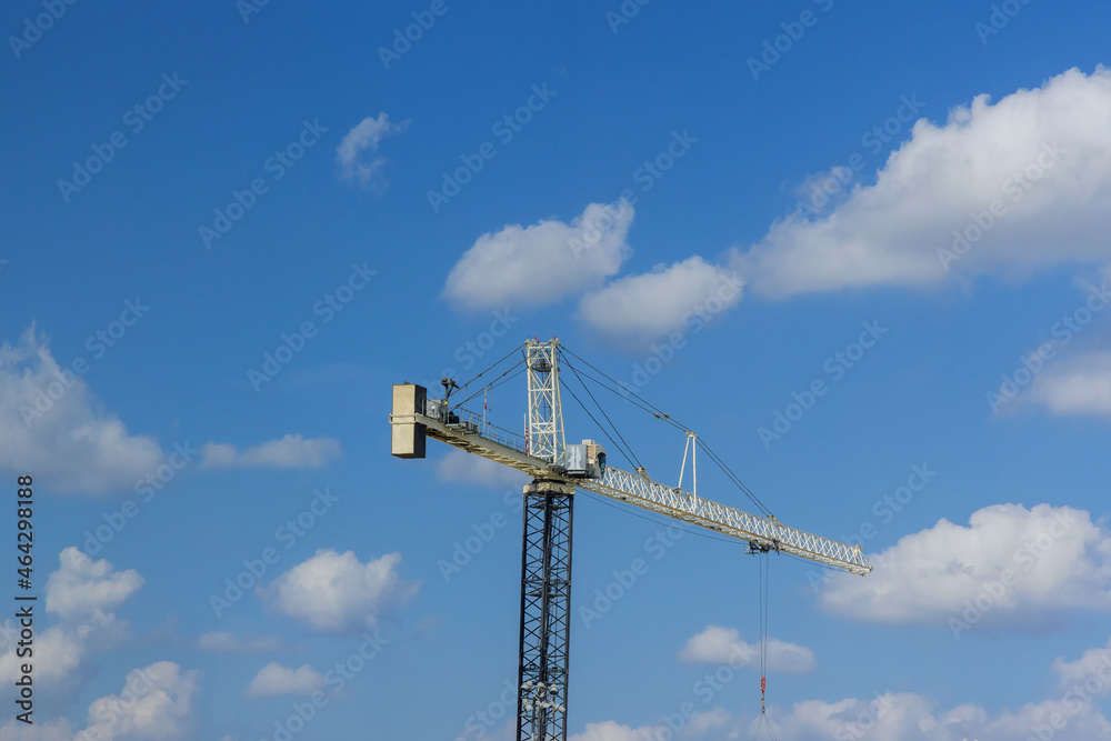 Large construction site including cranes working on a building complex