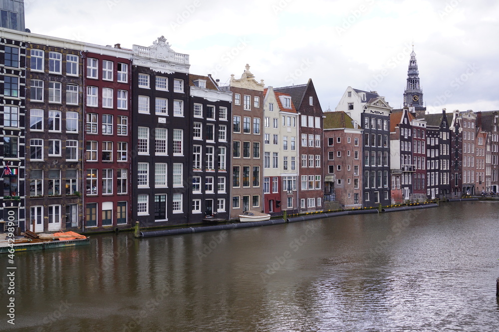 Amsterdam, Netherlands: traditional narrow houses overlooking the river