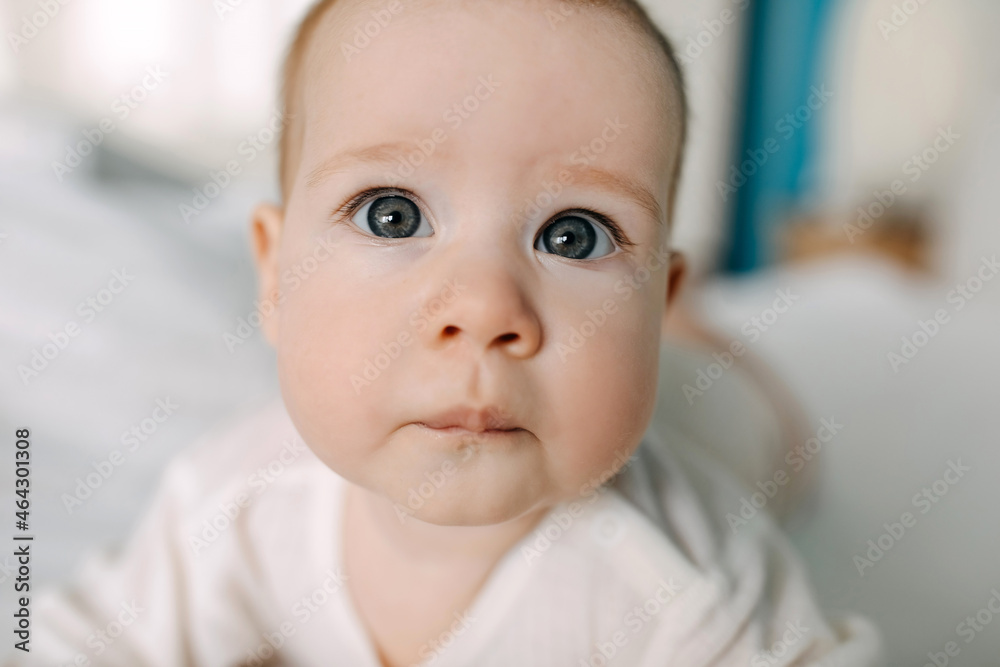 Closeup of a baby face with big blue eyes. Closeup of a baby face with big blue eyes.