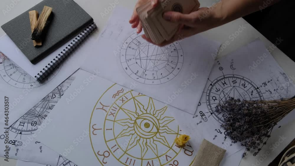 Astrology. Astrologer calculates natal chart and makes a forecast of fate.Tarot cards, Fortune telling on tarot cards magic crystal, occultism, Esoteric background. Fortune telling,tarot predictions.