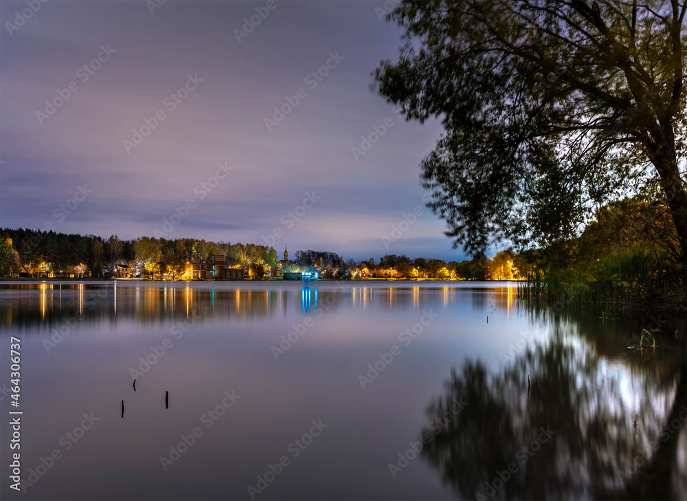 Moscow. October 15, 2021. Meshchersky park and pond at midnight. Nice view with reflection of night illumination