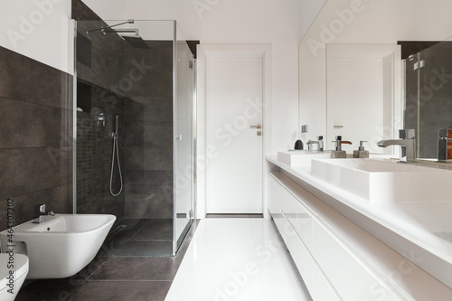 Horizontal view of white and grey bathroom