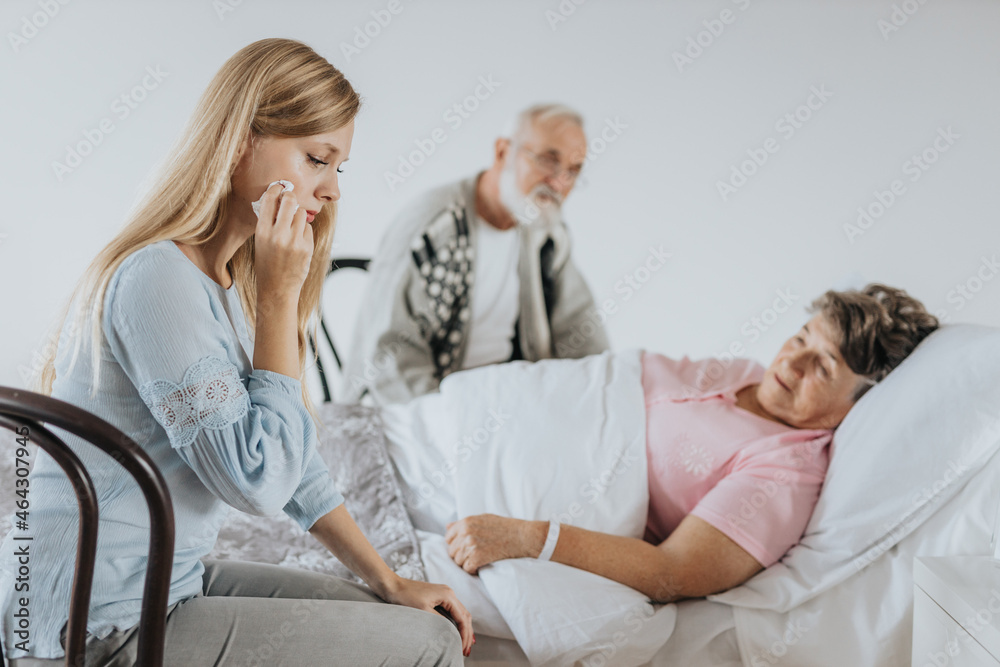 Fototapeta premium Woman crying in hospital