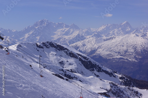 View of the snowy mountain peaks around Pila in Aosta Valley (Italy)