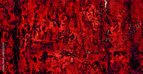 Dark wall surface with red paint