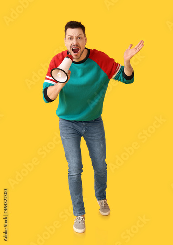 Protesting man with megapho...