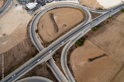 Aerial drone view of a modern designed highway public road. Road transportation