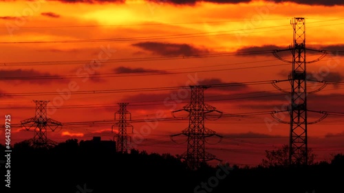 Tokyo,Japan - October 21, 2021: High voltage electricity transmission line tower on morning sky
 photo