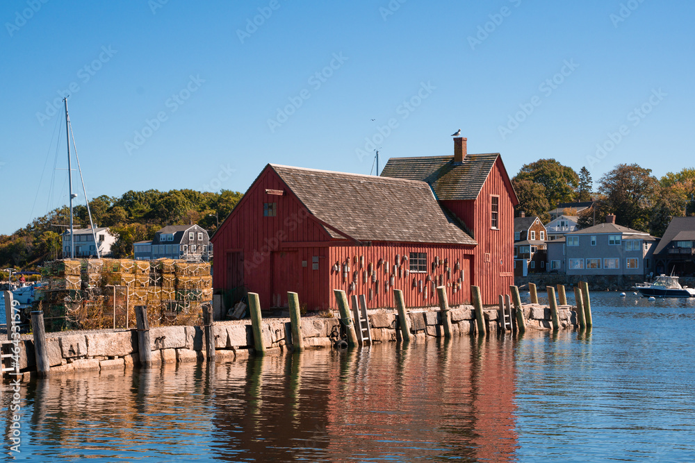 Historic red fishing shack, Motif No. 1, seen from New England Coastal Village of Rockport Massachusetts seen on a sunny day