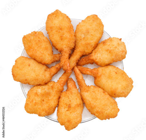 Фотография Breaded Butterfly Prawns - Deep fried battered prawns filled in plate on white b