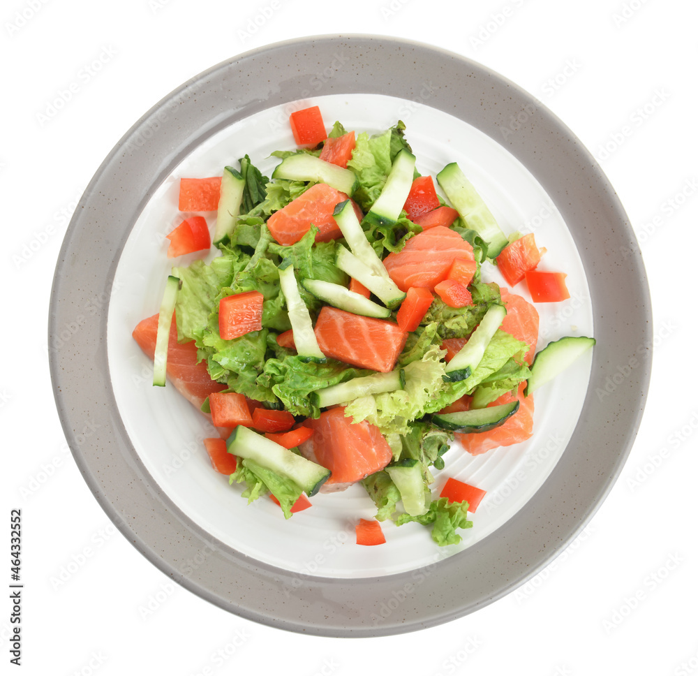 Delicious salad with salmon and vegetables in plate on white background