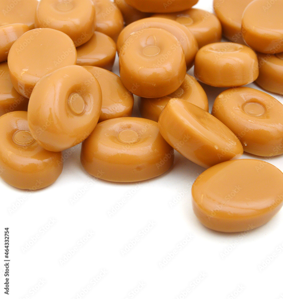 caramel candies over white