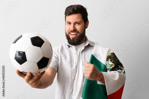 Sport fan with soccer ball ...