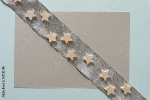 christmas star shapes on silver crepe paper