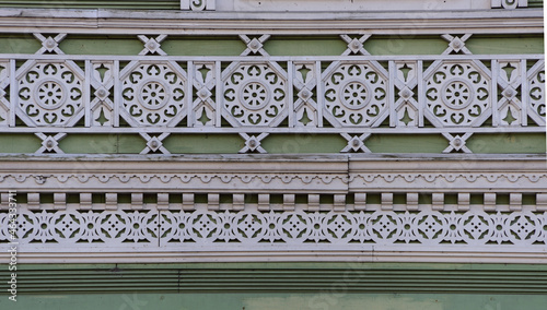 Peterhof. Protective ornament on a green background in the form of stylized solar discs, tips and battlements of the fortress walls.

