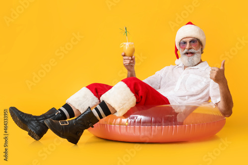 Santa Claus with swimming r...