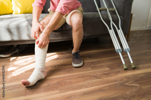 Hispanic man with an uncomfotable bandage