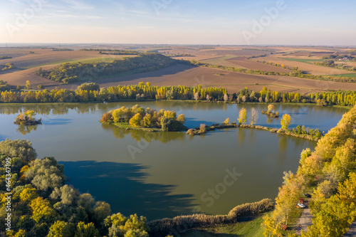 Hungary - S  t  tv  lgyi lake near Baja city at autumn time and colors from drone view