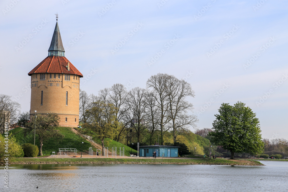Obraz premium Slottsparken park pond and old tower panorama, Malmo, Sweden