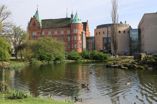 Slottsparken park pond and city library buildings, Malmo, Sweden photo