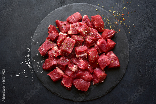 Raw organic meat ( beef or lamb ) . Top view with copy space.